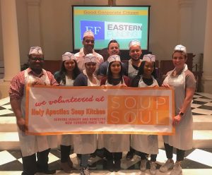 Eastern Funding team group picture volunteering at Holy Apostle Soup Kitchen